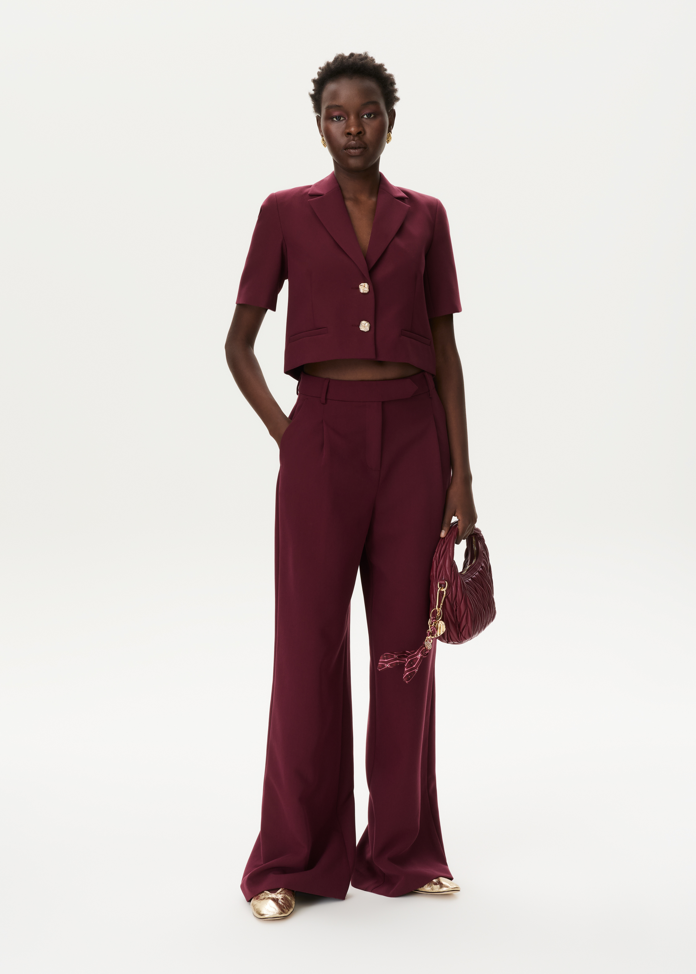 Pantalon met plooidetails